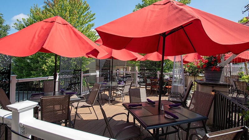 Patio seating with red umbrellas