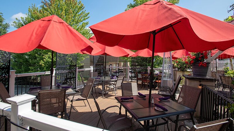 Patio seating with red umbrellas - Caffe' Na Vona - Gallery Photo 2 Patio seating with red umbrellas